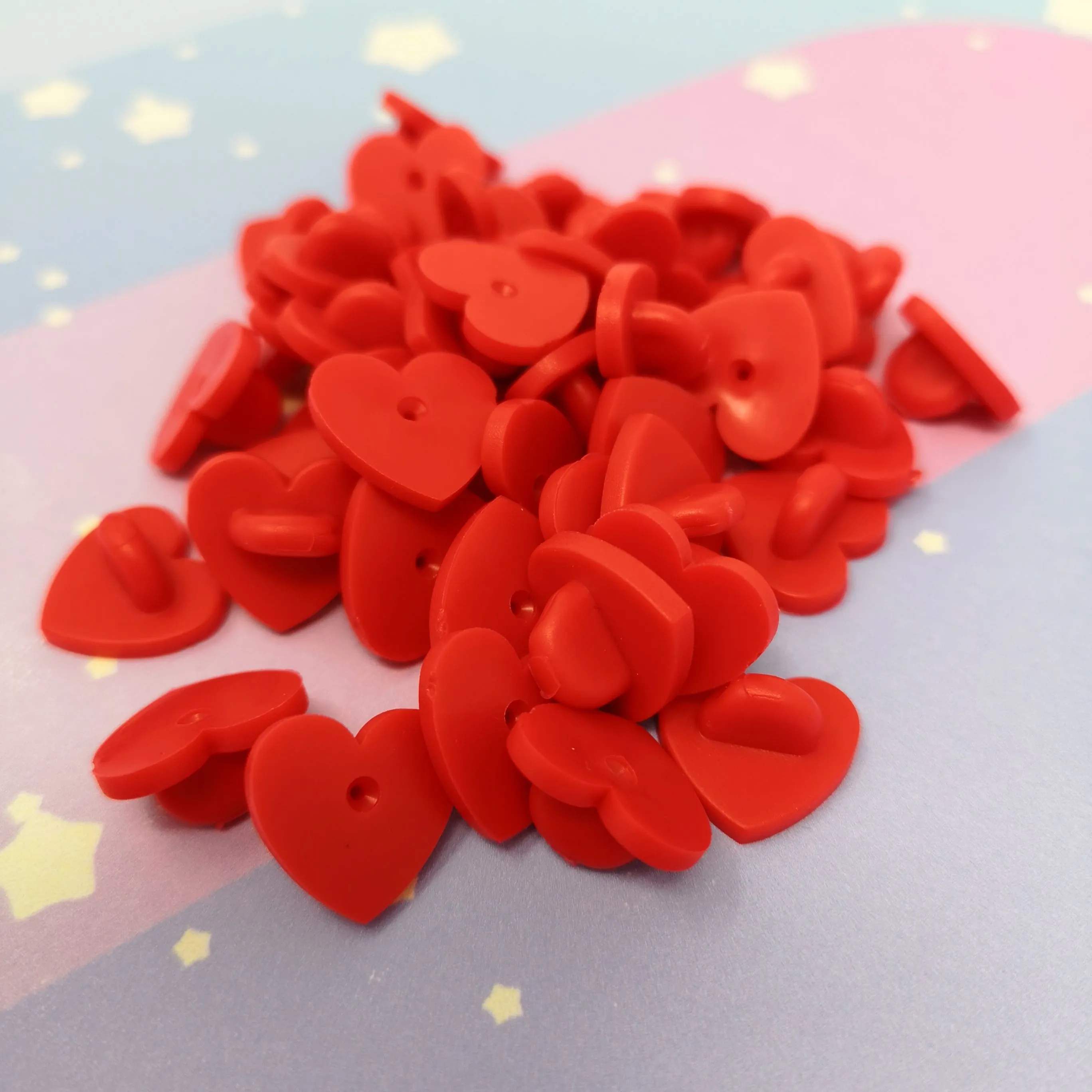 Heart shaped rubber pinbacks